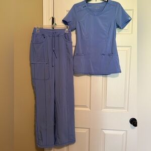 Blue XS scrubs.